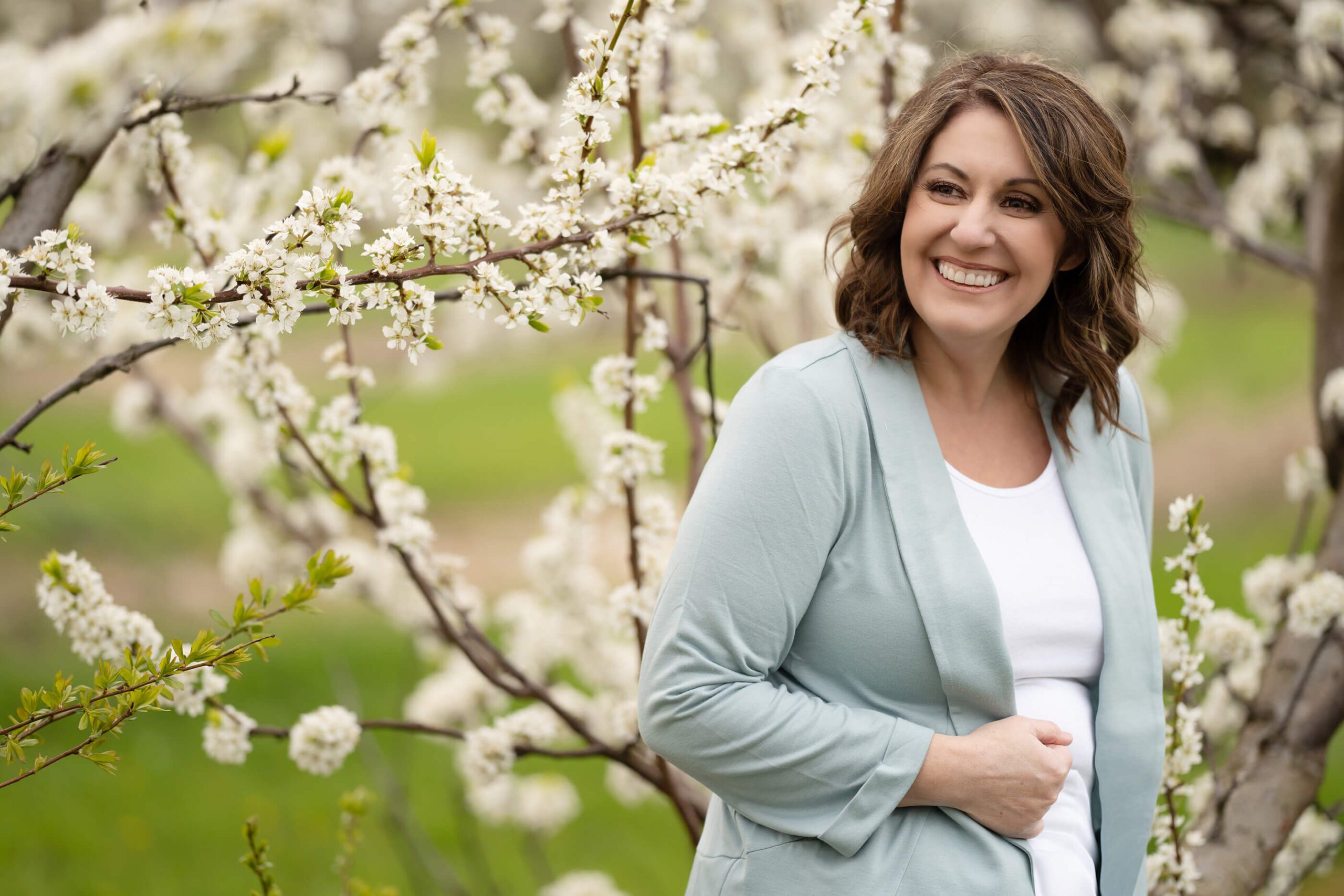 Amanda Gibson of Gibson Photography laughing headshot photo at the Cherry Blossoms Toronto Maternity Photographer