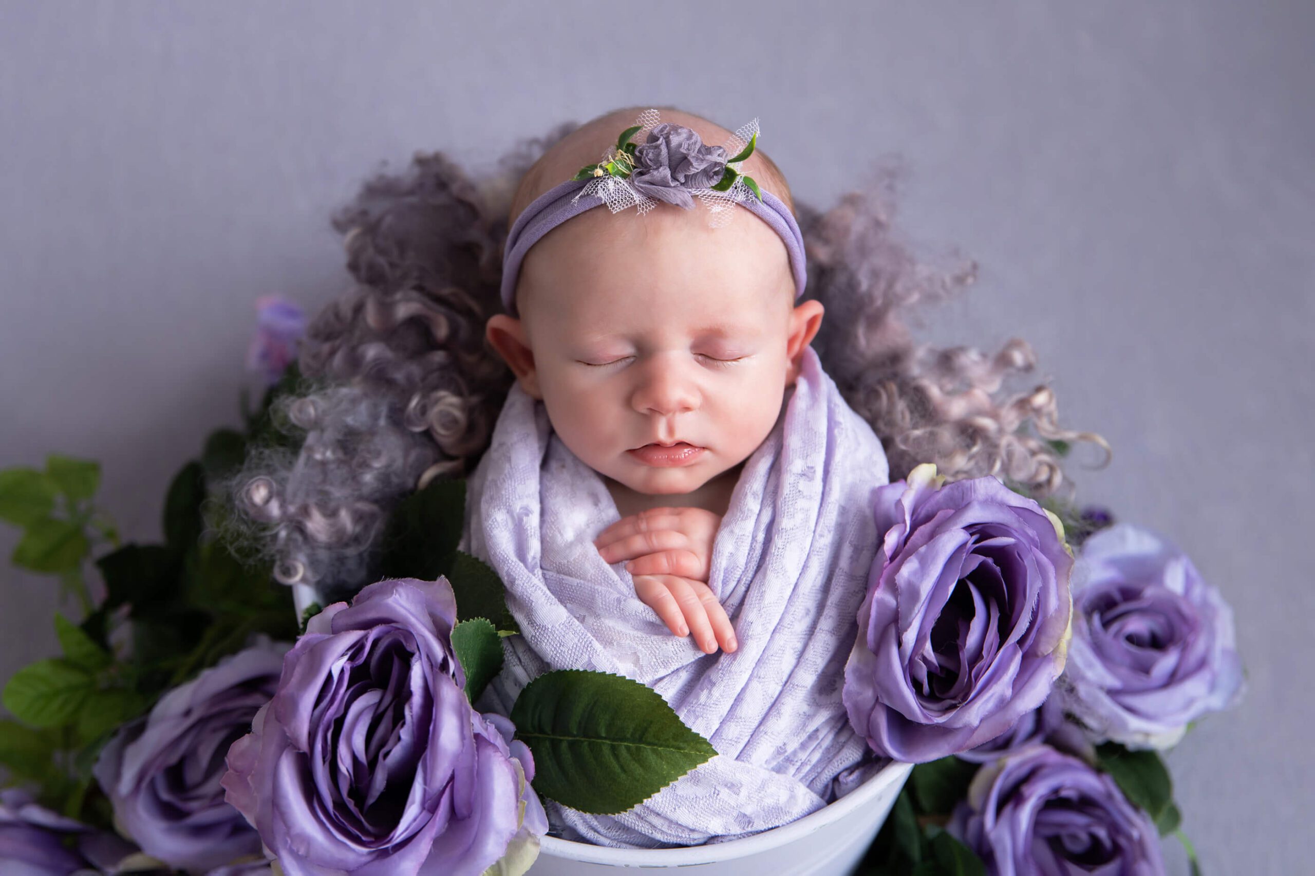 baby girl with purple florals
