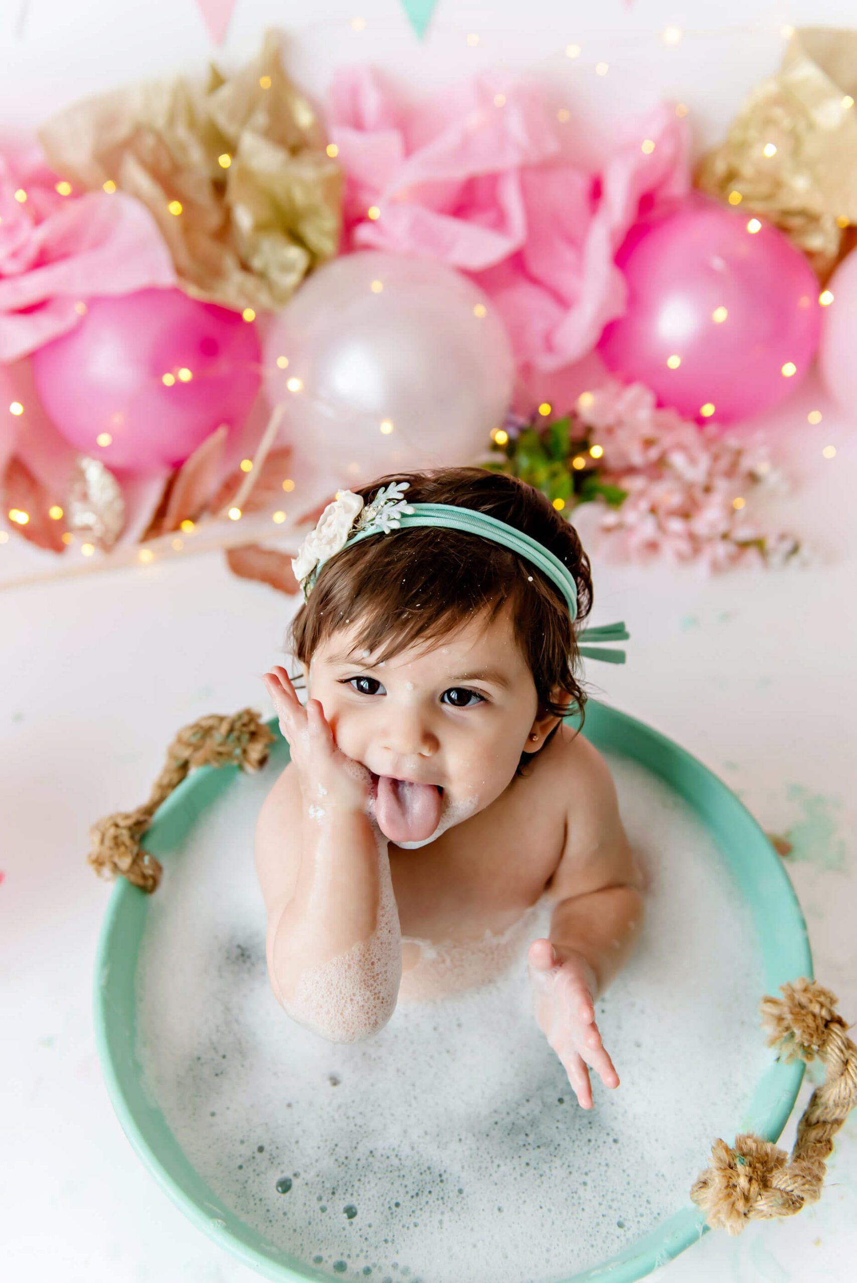 baby sticking out tongue cake smash portrait session