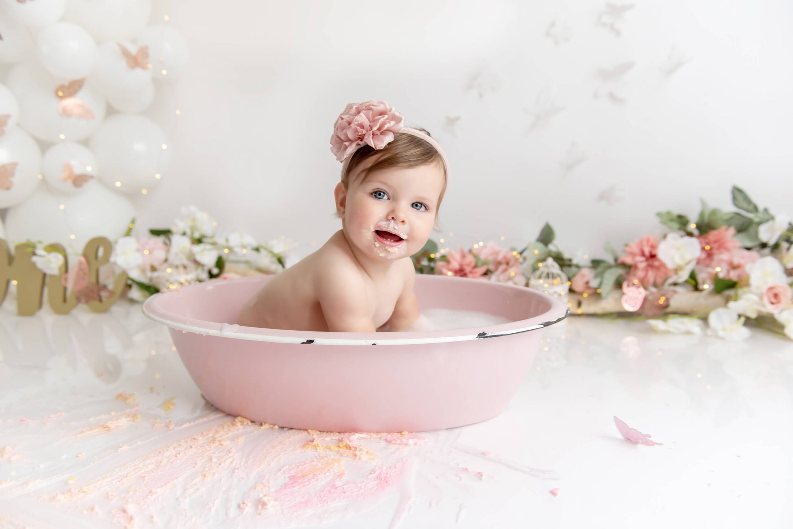 Bubble Bath after first birthday pink butterfly floral cake smash Burlington