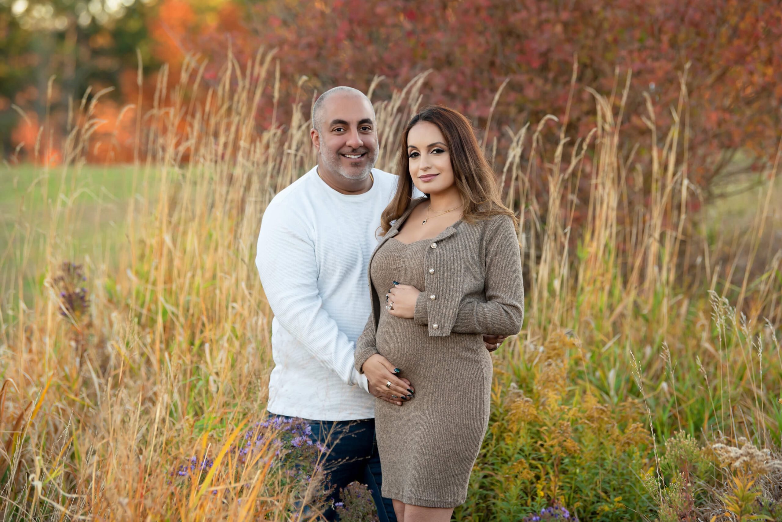 husband and wife fall maternity photography session