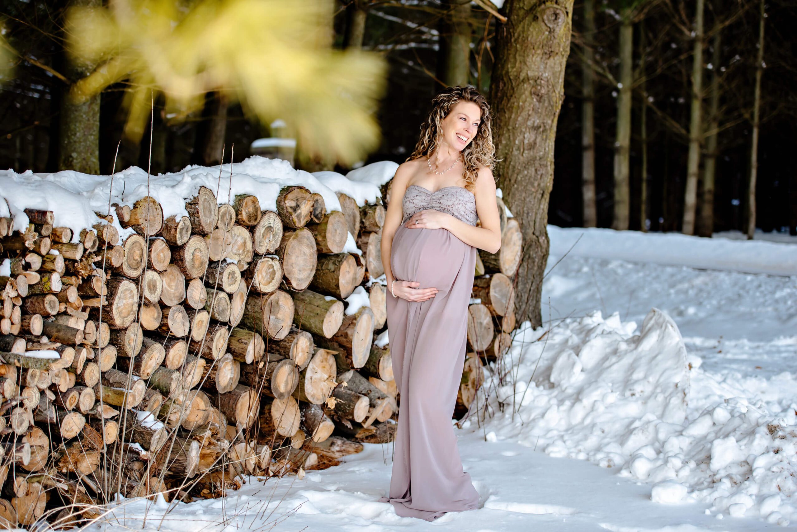 stunning outdoor winter maternity session with lots of snow