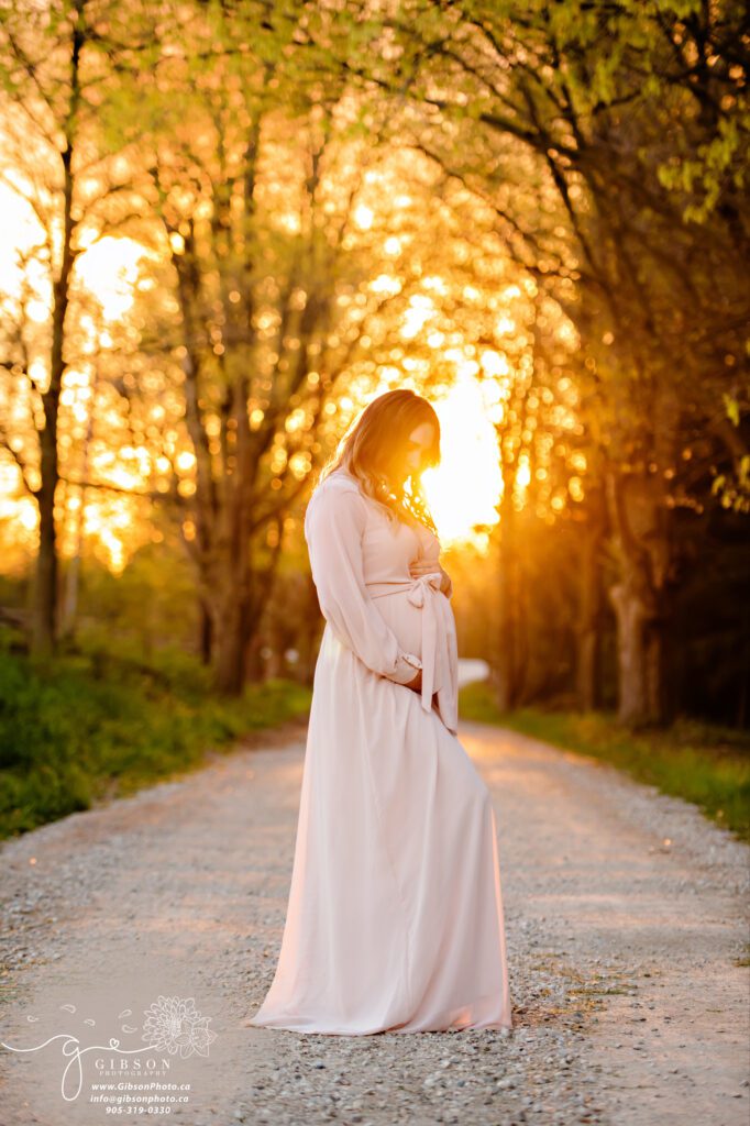 mom with the golden hour at a farm. UC baby Hamilton, Ontario