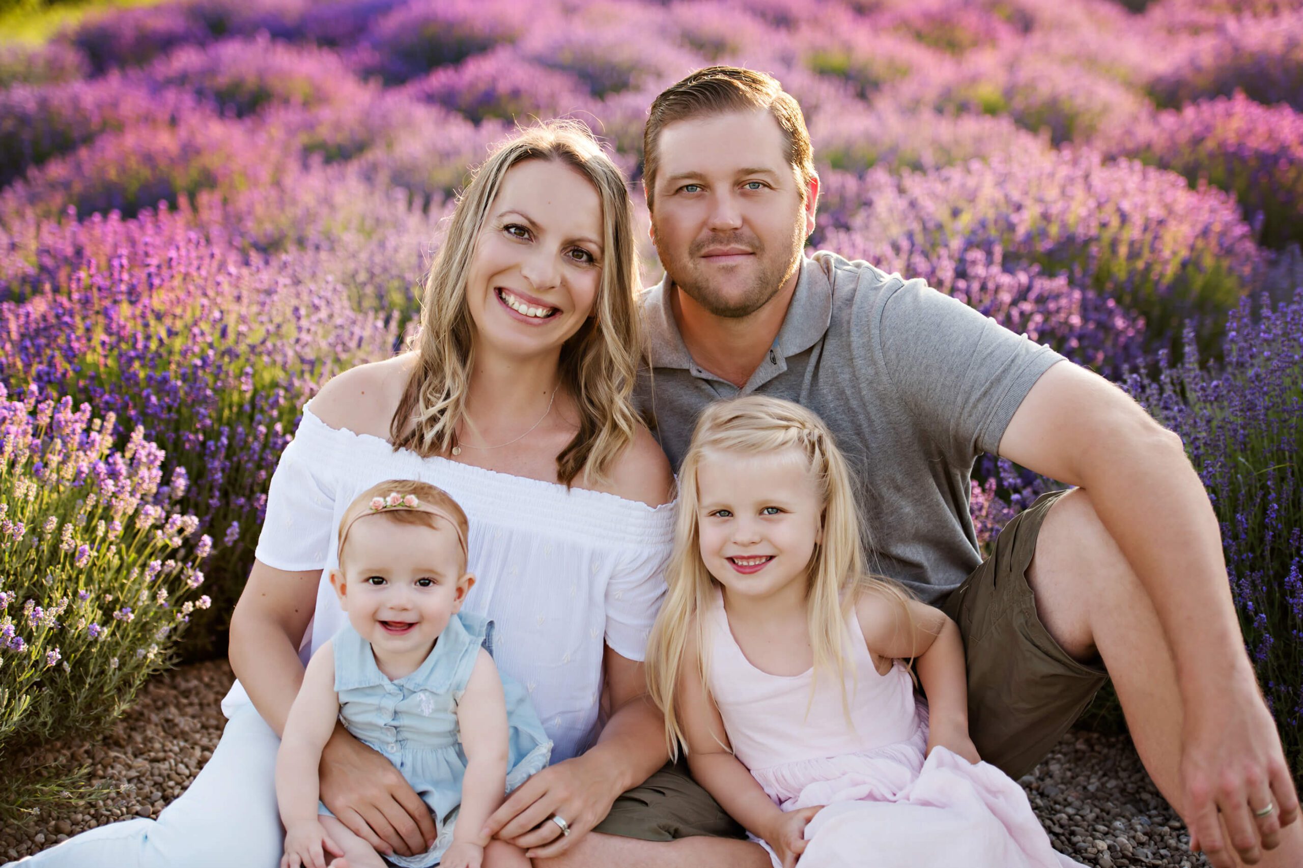 family of four in the lavender field at sunset