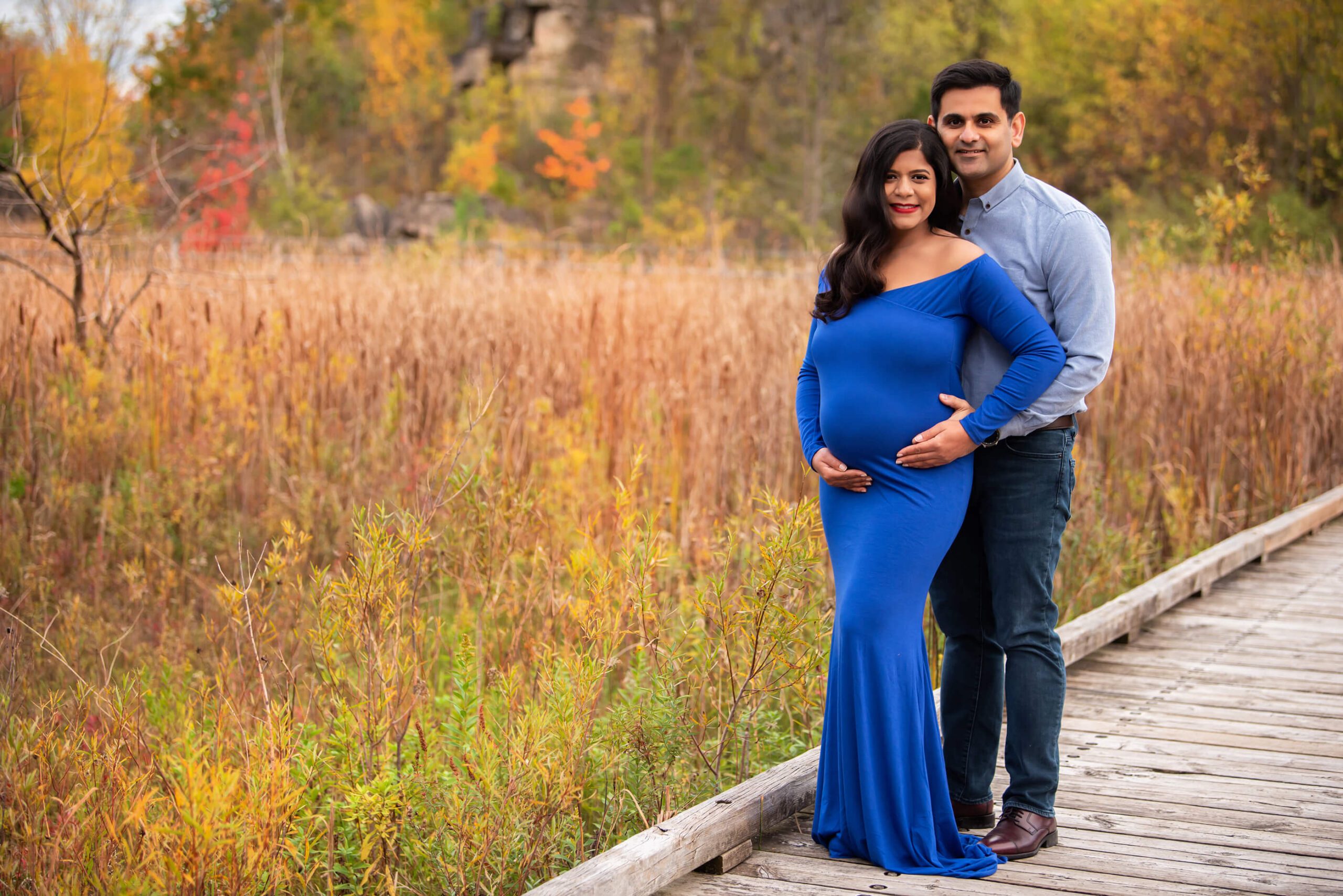 fall maternity photography session mom and dad to be