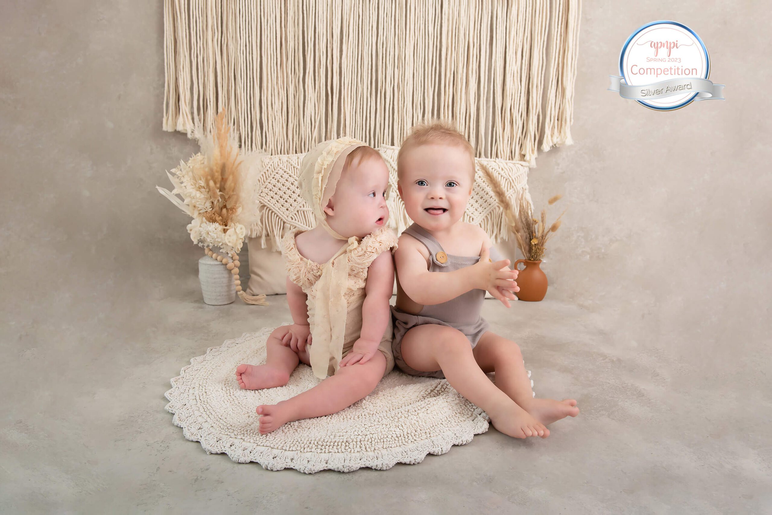 Boy and girl sitters with down syndrome boho style session Toronto Pediatricans