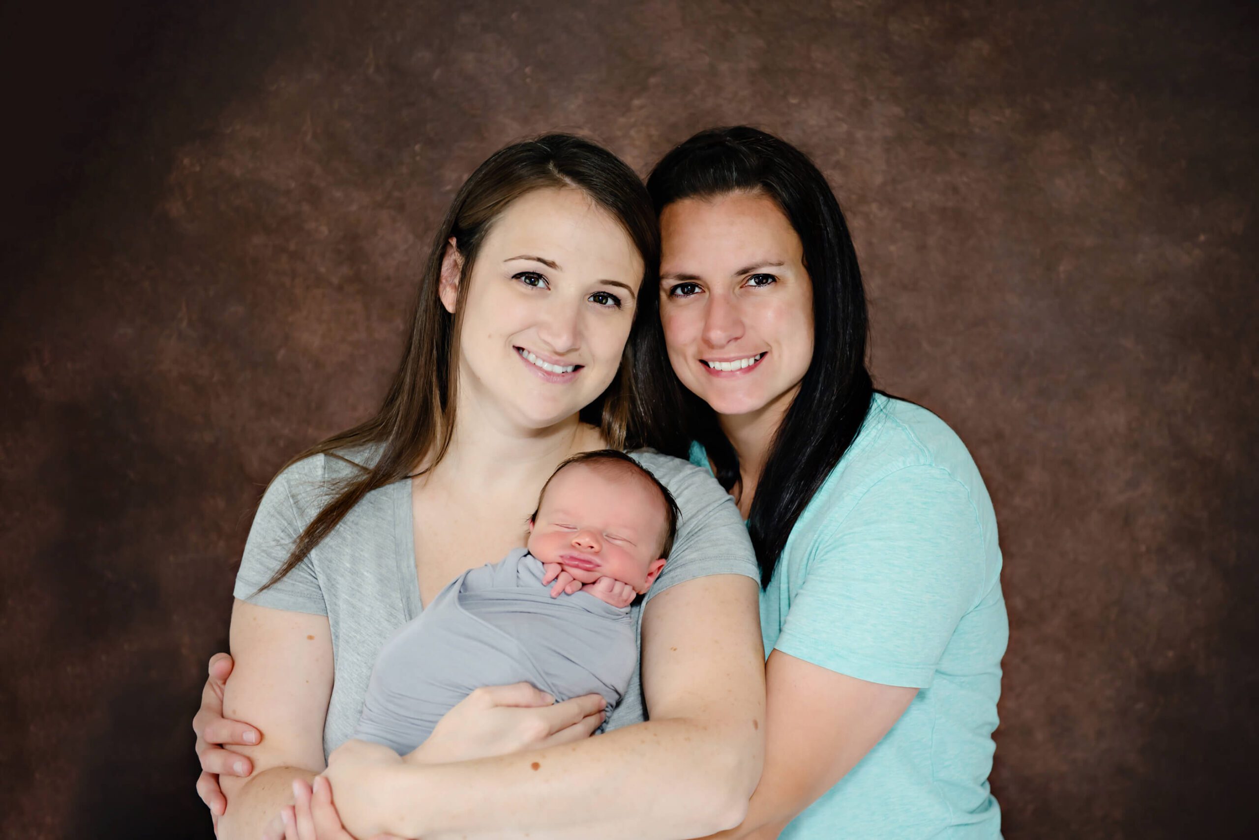 Same set couple with their newborn baby, One Fertility Burlington, Ontario