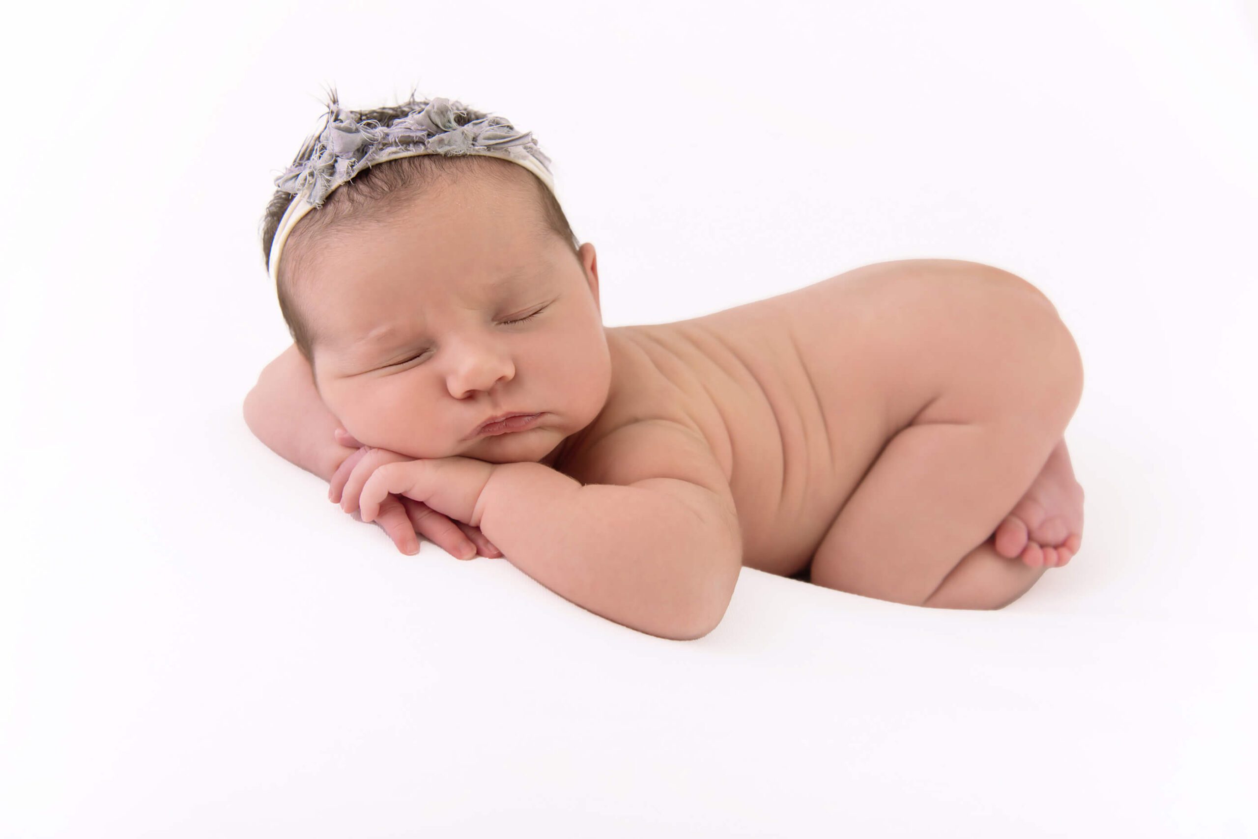 Burlington newborn photographer newborn baby on all white