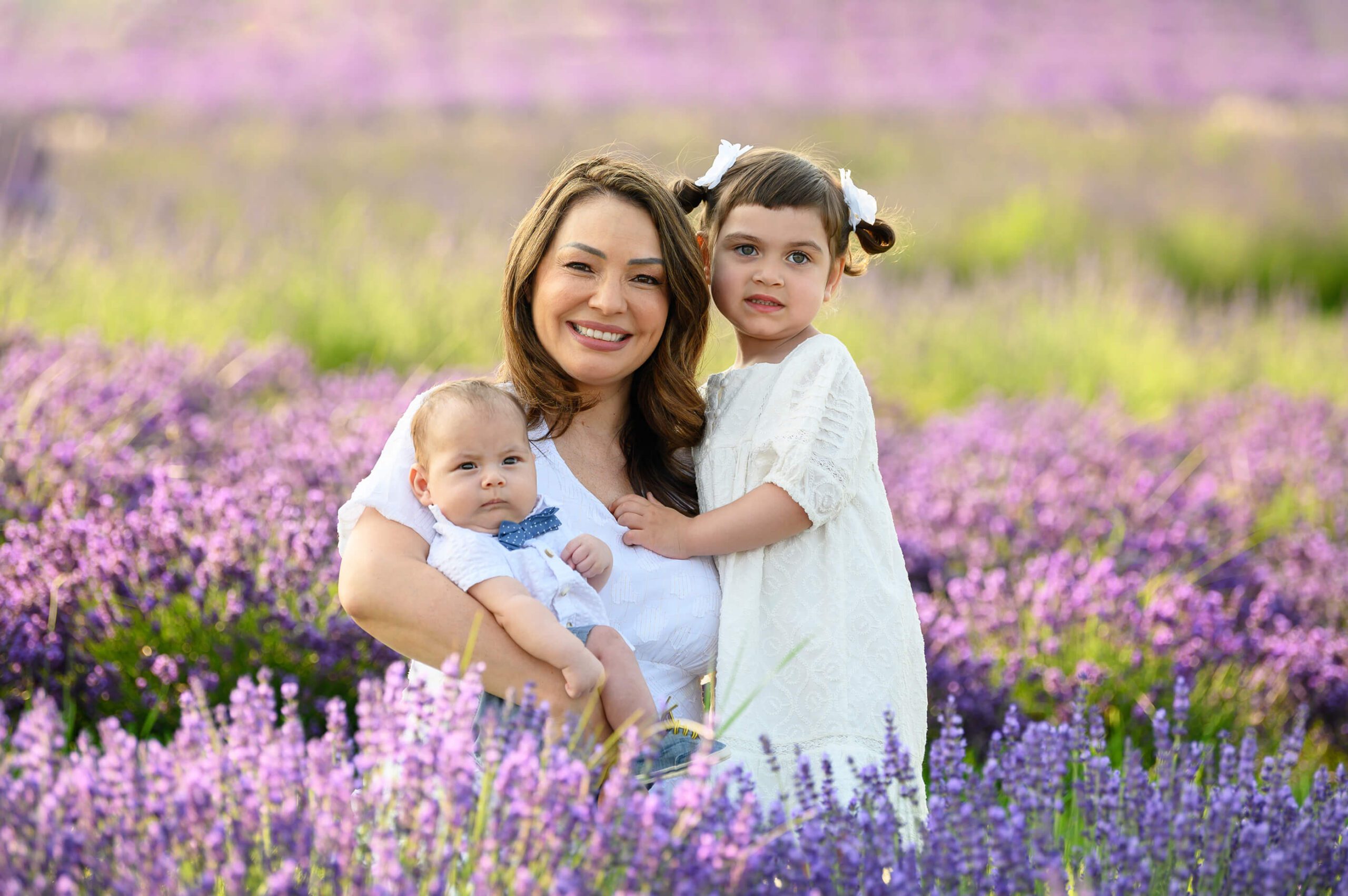 mom with her babies in a beautiful lavender farm in Milton Ontario