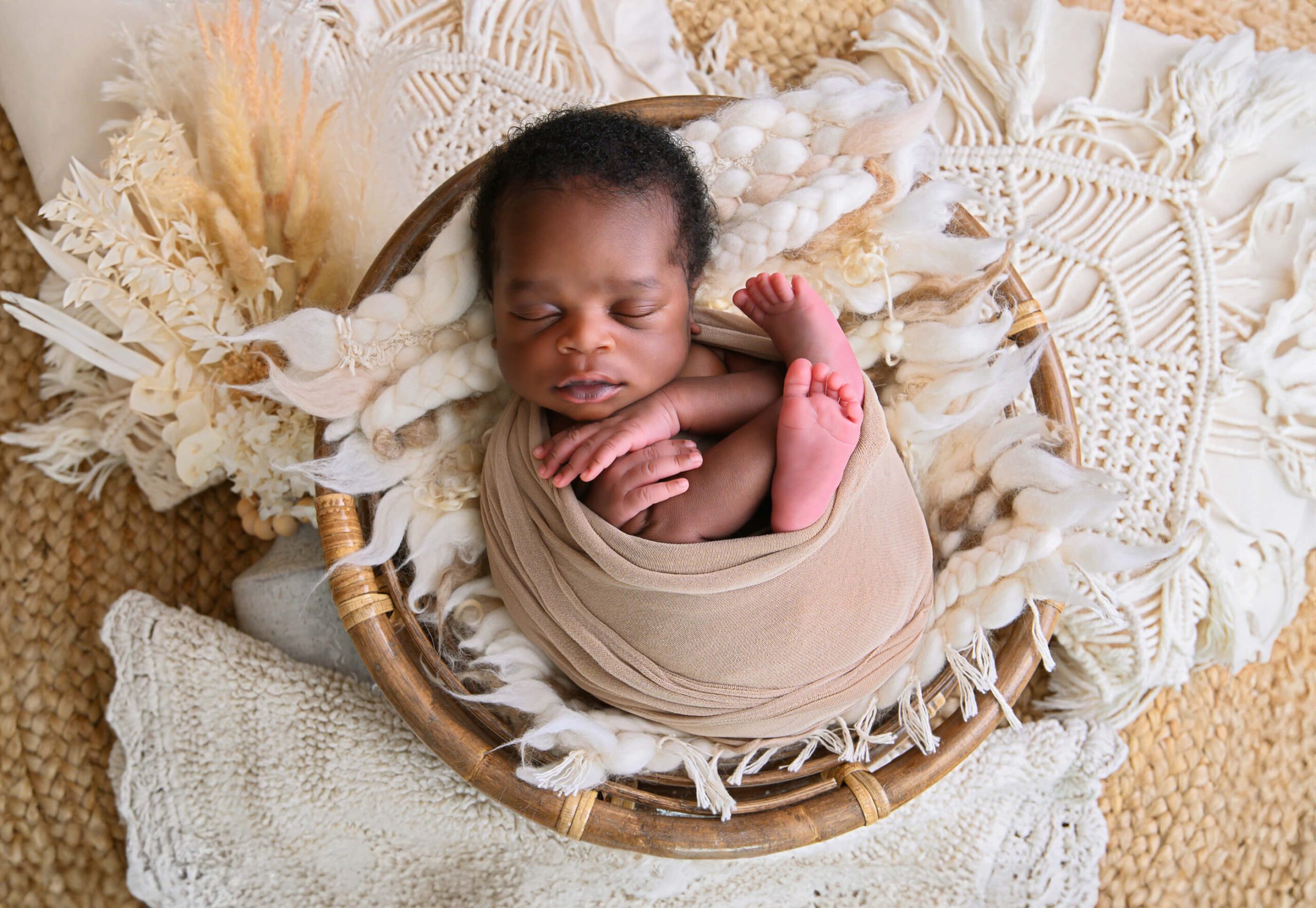 Boho newborn photography session baby boy